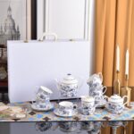 Dior Toile de Jouy teacup and saucer set in a white and blue