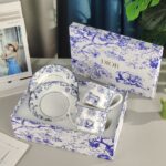 Dior Toile de Jouy teacup and saucer set in a white and blue